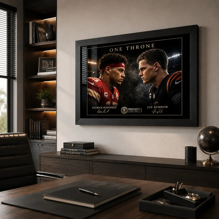 Black framed Mahomes vs Burrow NFL wall art displayed above a dark wood cabinet in a modern office.