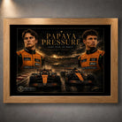 Oak framed Papaya Pressure Piastri vs Norris motorsport wall art shown against a textured grey wall.