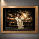 Pat Cummins The Captain’s Roar cricket wall art shown in a premium oak frame against a textured grey wall.