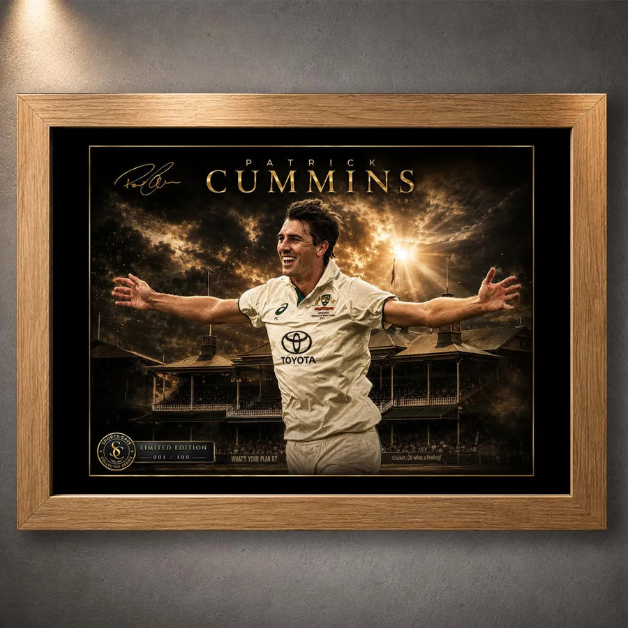 Pat Cummins The Captain’s Roar cricket wall art shown in a premium oak frame against a textured grey wall.