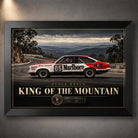 Peter Brock King of the Mountain wall art in a black frame, featuring the red and white number 05 racing car.