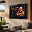 Devin Booker Phoenix Hero basketball wall art in a contemporary living room, shown in a black frame above a sofa.