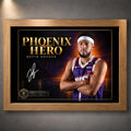 Oak framed Devin Booker Phoenix Hero wall art featuring the basketball design in a warm natural wood frame.