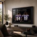Purple Reign Randy Moss and Justin Jefferson wall art in a modern living room, shown in a black frame.