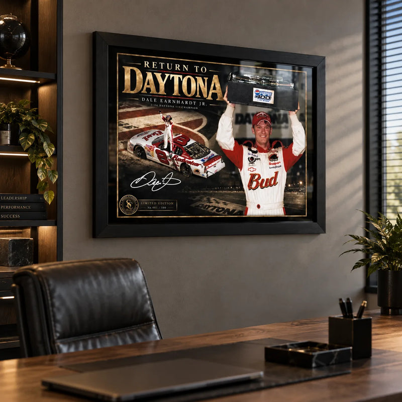 Dale Earnhardt Jr. NASCAR wall art displayed in a modern office, shown in a black frame above a timber desk.