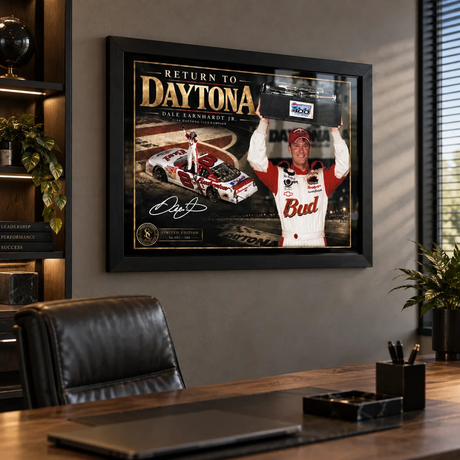 Dale Earnhardt Jr. NASCAR wall art displayed in a modern office, shown in a black frame above a timber desk.