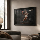 Dennis Rodman basketball wall art displayed in a black frame on a warm neutral living room wall.