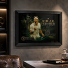 Tennis wall art in a black frame on a textured man cave wall with shelves and leather seating.