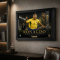 Black framed Ronaldo Nazário Brazil 2002 soccer wall art displayed in a dark premium man cave.