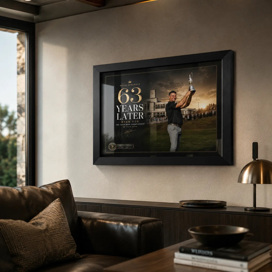 Ryan Fox Open Championship wall art displayed in a warm modern living room with leather seating and neutral finishes.