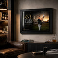 Ryan Fox golf wall art mounted in a dark premium man cave with timber shelving, leather seating and a home bar.