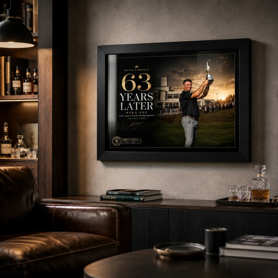 Ryan Fox golf wall art mounted in a dark premium man cave with timber shelving, leather seating and a home bar.