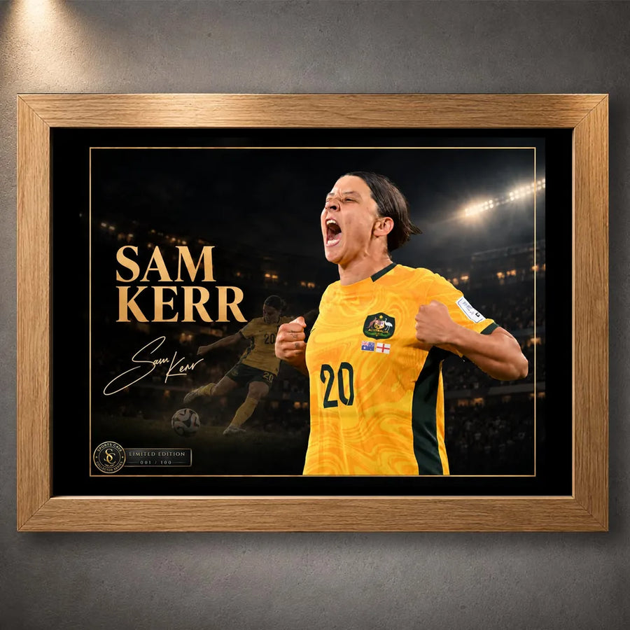 Oak framed Sam Kerr Matildas soccer wall art featuring Kerr in Australia's yellow kit with a dark stadium backdrop.