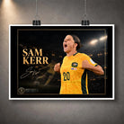 Unframed Sam Kerr Matildas soccer wall art print featuring Kerr in Australia's yellow kit with a dark stadium backdrop.