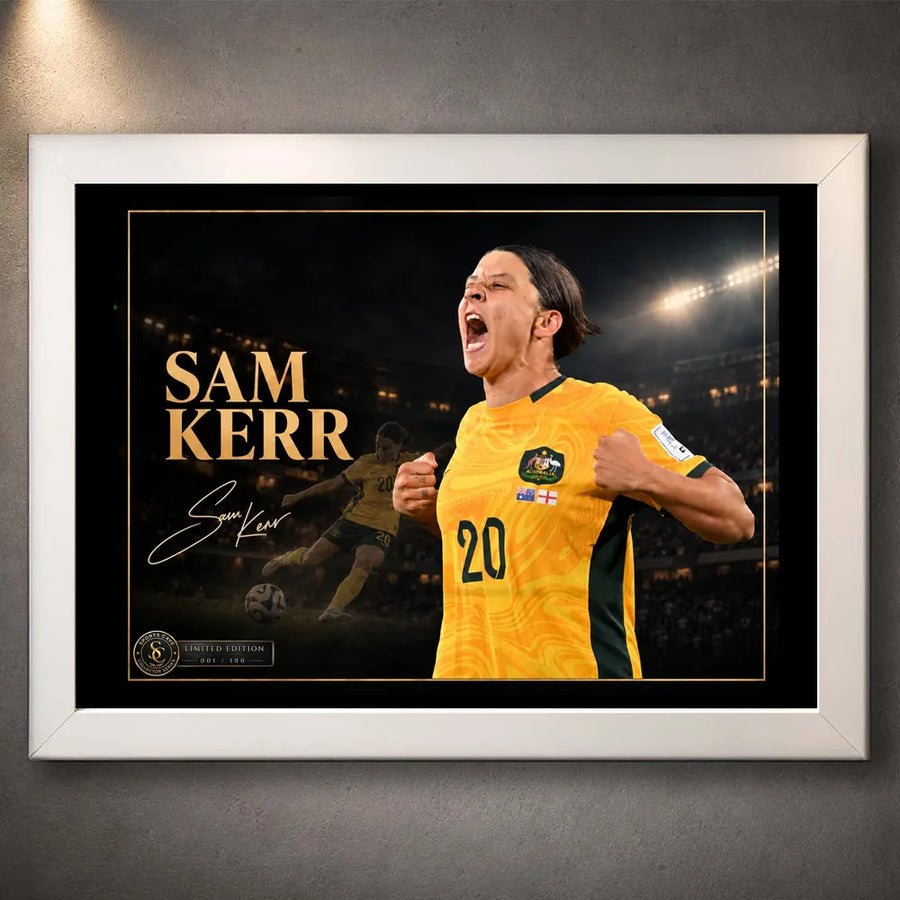 White framed Sam Kerr Matildas soccer wall art featuring Kerr in Australia's yellow kit with a dark stadium backdrop.