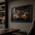 Classic basketball rivalry wall art in a modern office with shelves and a desk