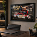 Trevor Bayne NASCAR wall art displayed in a premium office setting with a black frame and dark wood furnishings.