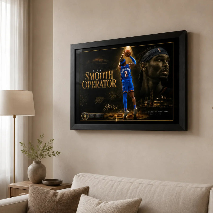 Black-framed Shai Gilgeous-Alexander basketball wall art displayed above a neutral sofa in a bright modern living room.