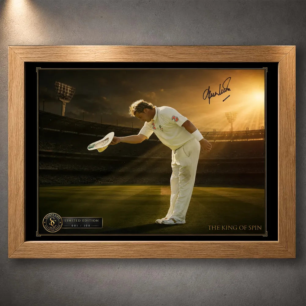 Oak framed Shane Warne cricket wall art showing his bowing tribute beneath warm stadium light.