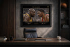 Shaq vs Hakeem framed sports memorabilia showcased in a luxury office with warm lighting and basketball-themed interior