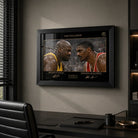 Shaq vs Hakeem basketball wall art in a premium office setting with black frame, desk, and window light