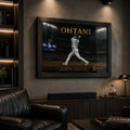 Shohei Ohtani framed baseball wall art displayed in a dark man cave with leather seating and warm display lighting.