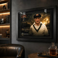 Sir Donald Bradman framed cricket wall art mounted in a dark premium man cave with warm shelf lighting.