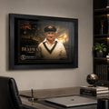 Sir Donald Bradman framed cricket wall art displayed above a refined office desk in a masculine study.