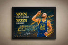 Framed Stephen Curry wall art featuring motivational quote, Warriors jersey, and Curry pointing upward in celebration.