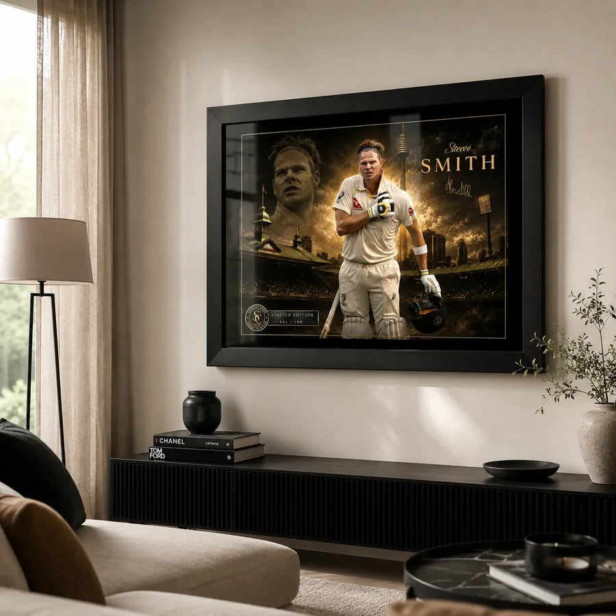 Steven Smith cricket wall art in a black frame displayed above a console in a bright modern living room.