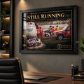 Dale Earnhardt Sr. NASCAR wall art displayed in a modern office with a black frame.