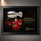 Black framed Patrick Kane hockey wall art showing him lifting the Stanley Cup in the Suddenly Champions 2015 design.