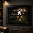 Jonathan Thurston wall art displayed in a dark man cave, with the black framed 2015 golden-point design as the focal piece.