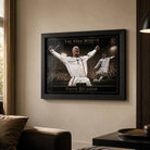 David Beckham framed sports art displayed in a warm premium living room with soft window light.