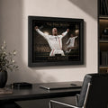 David Beckham framed soccer artwork shown above a clean office desk in a refined black frame.