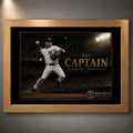 Derek Jeter The Captain baseball wall art shown in an oak frame with black matting and gold collector details.