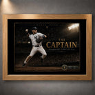 Derek Jeter The Captain baseball wall art shown in an oak frame with black matting and gold collector details.