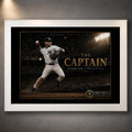 Derek Jeter The Captain baseball wall art shown in a white frame with black matting and gold collector details.