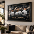 Mattingly, Jeter and Judge wall art displayed in a bright living room above a neutral sofa.