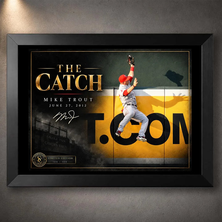 Black framed Mike Trout baseball wall art featuring The Catch collector design with the outfield-wall leap and gold title.