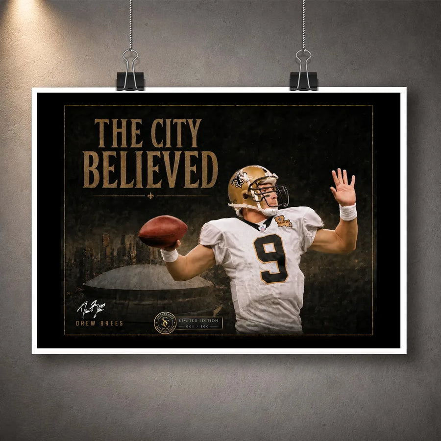 Unframed The City Believed New Orleans NFL wall art print featuring a quarterback, gold title typography and stadium backdrop.