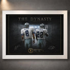 White framed Aikman and Smith wall art featuring The Dynasty design with Dallas #8 and #22 in a dark tunnel.