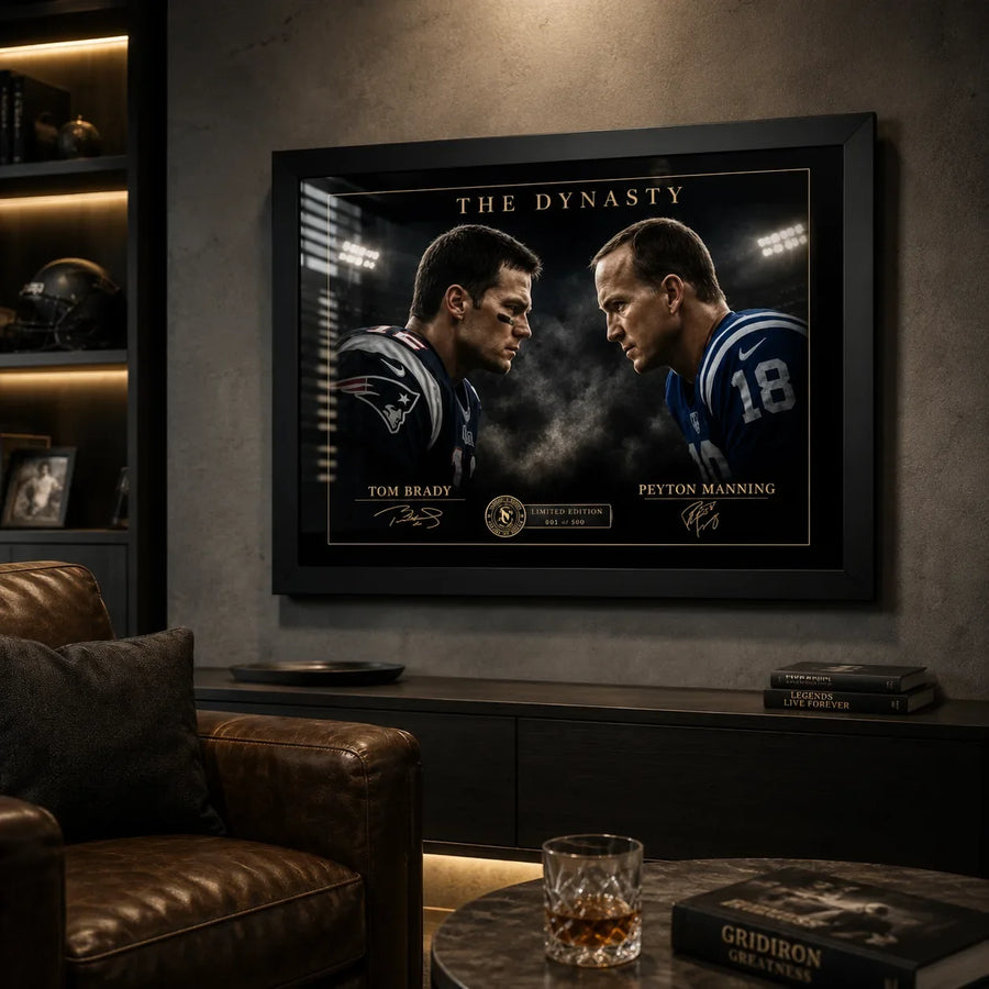 The Dynasty Brady vs Manning wall art in a dark premium man cave with leather seating and illuminated shelving