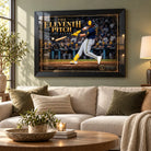 Black framed Jake Bauers wall art displayed above a sofa in a light living room with neutral furnishings.