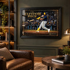 Jake Bauers wall art in a black frame displayed in a dark man cave with leather seating and illuminated shelves.
