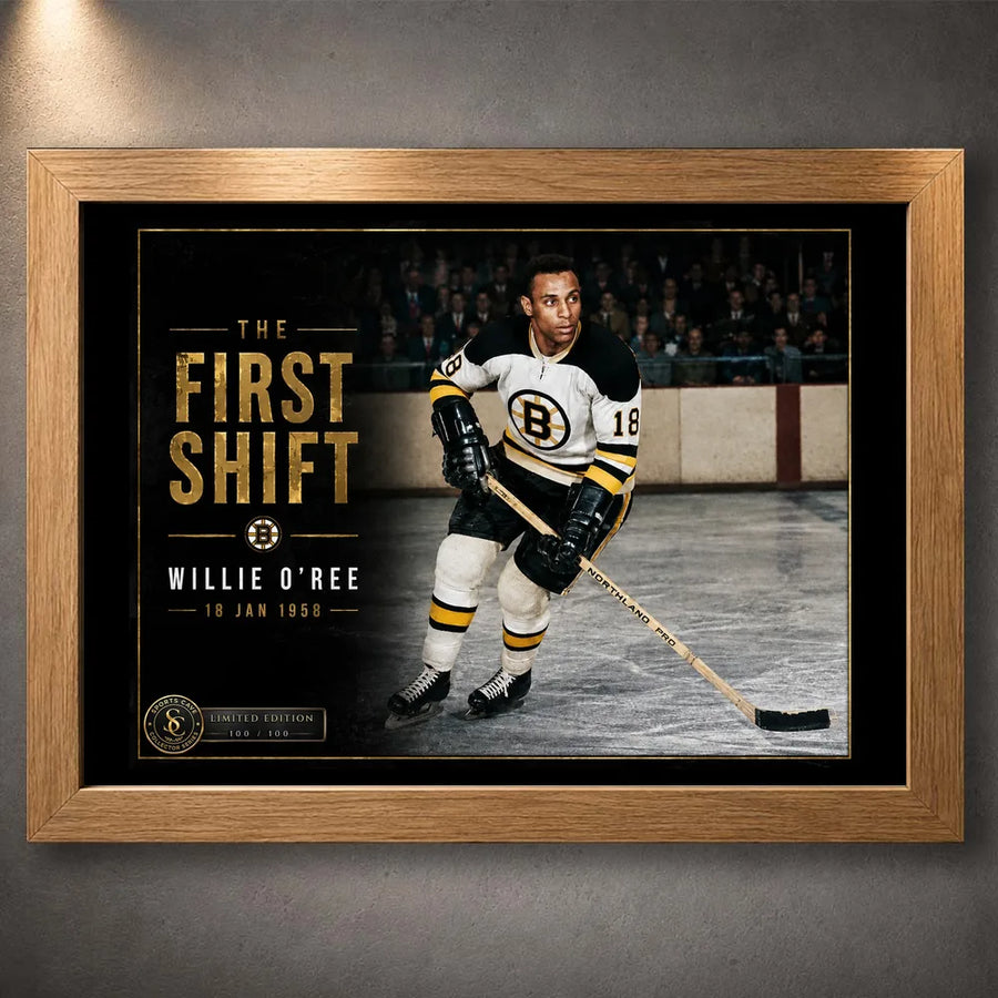 Oak framed Willie O'Ree hockey wall art featuring The First Shift design for a warm-toned collector display.