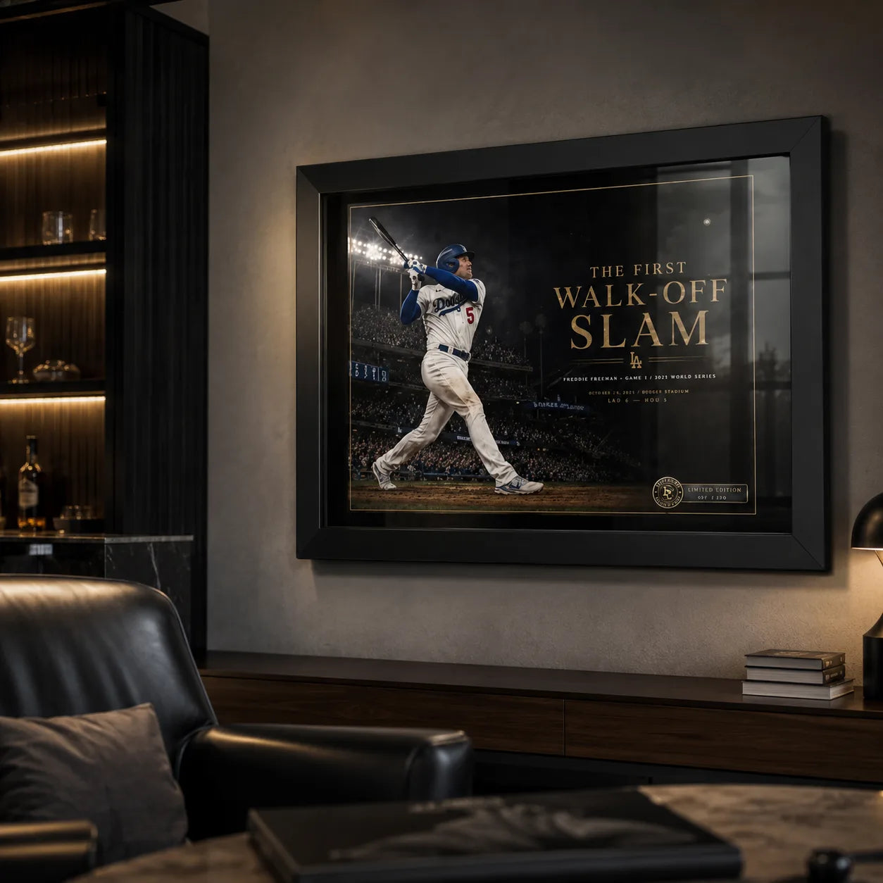 Freddie Freeman baseball wall art in a dark luxury man cave with bar shelving and leather seating.