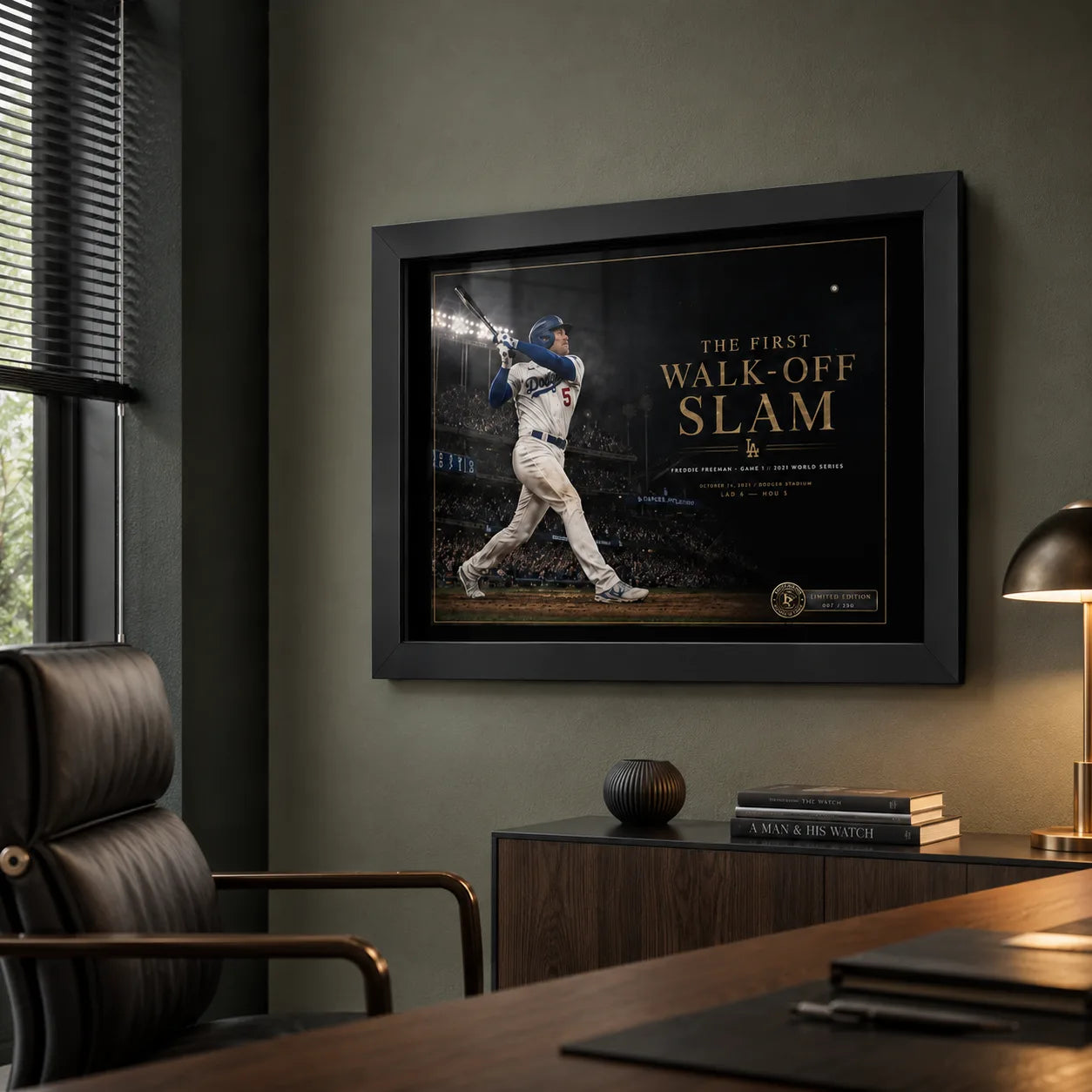 Freddie Freeman wall art styled in a modern office above a dark timber cabinet and executive chair.