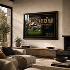 Benji Marshall wall art featuring The Flick Pass displayed in a contemporary living room with a black frame.