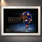 White framed Matthew Schaefer hockey wall art featuring The Future Arrived design against a dark gallery-style wall.